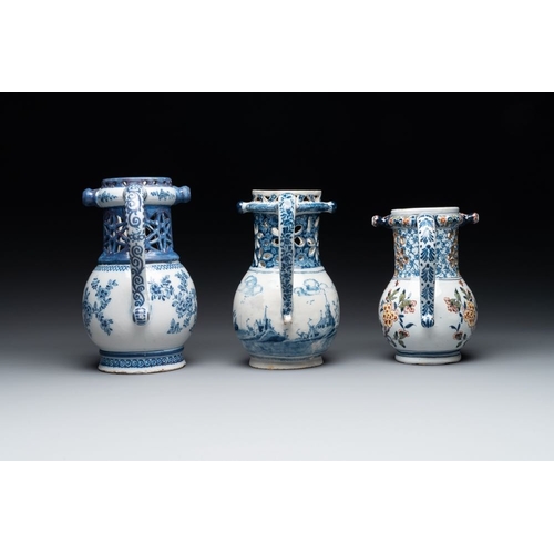 1132 - Two blue and white and one polychrome Dutch Delft puzzle jugs, dated 1734 and 1705, 18th C. and late... 