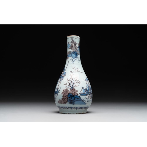 1140 - A Dutch Delft blue, white and manganese chinoiserie bottle vase, late 17th C.H.: 21 cm
Marked SVE ab... 