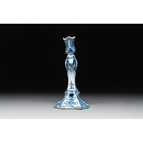 1148 - A Dutch Delft blue and white candle holder, 18th C.H.: 21,5 cm
Marked on the base with an axe for 