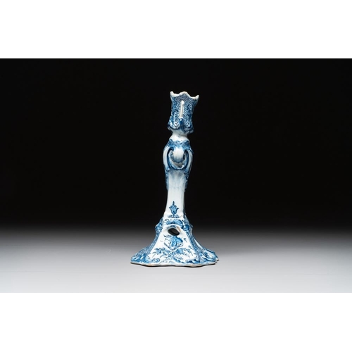 1148 - A Dutch Delft blue and white candle holder, 18th C.H.: 21,5 cm
Marked on the base with an axe for 