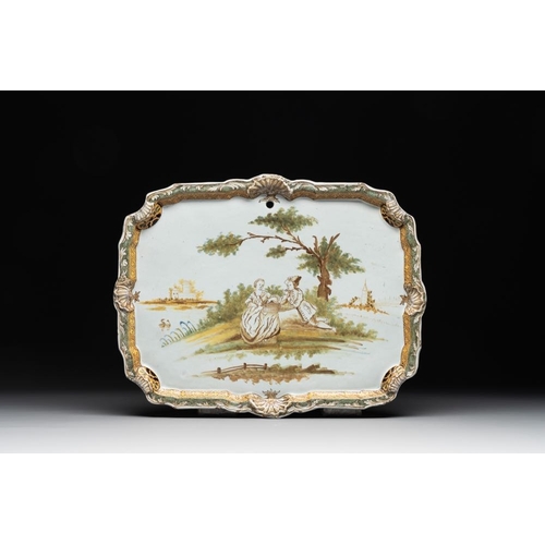 1157 - A polychrome Dutch Delft 'pastoral subject' plaque, 18th C.Dim.: 30 x 38,4 cm