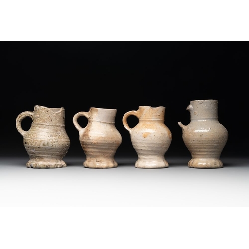 1171 - A collection of 9 German stoneware jugs, 16th C. and laterH.: 16,5 cm (the tallest)H.: 11,5 cm (the ... 