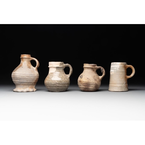 1171 - A collection of 9 German stoneware jugs, 16th C. and laterH.: 16,5 cm (the tallest)H.: 11,5 cm (the ... 