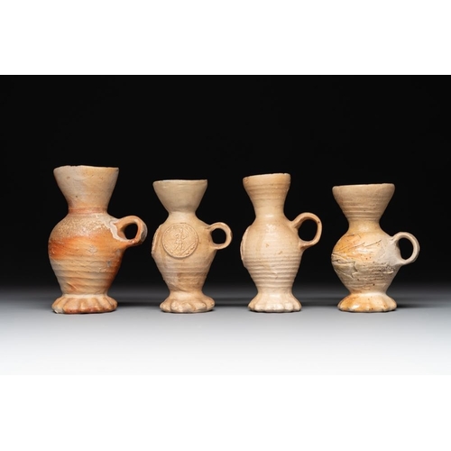 1175 - Twelve Siegburg stoneware funnel beakers, 15/16th C.H.: 16 cm (the tallest)H.: 11 cm (the smallest)... 