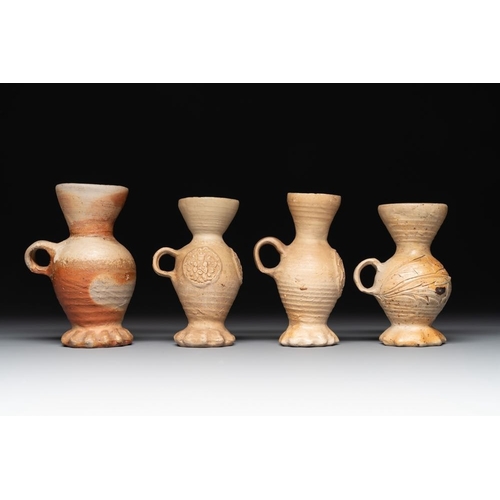 1175 - Twelve Siegburg stoneware funnel beakers, 15/16th C.H.: 16 cm (the tallest)H.: 11 cm (the smallest)... 