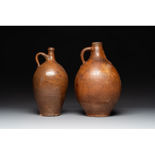 1184 - Three German stoneware jugs, including a bellarmine, and a French or English pottery jug, 17th C. an... 