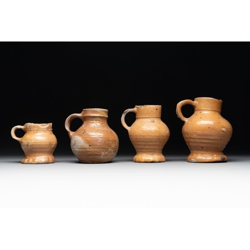 1186 - A collection of 13 German stoneware jugs, 15th C. and laterH.: 19,5 cm (the largest)H.: 9,5 cm (the ... 