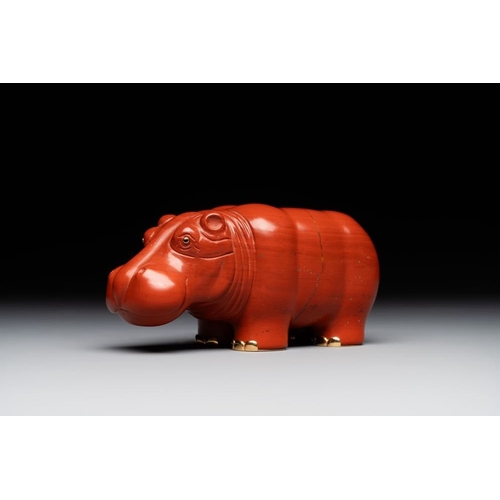 1191 - An 18kt gold mounted red jasper hippopotamus with sapphire inset eyes in Faberge-style, early 20th C... 