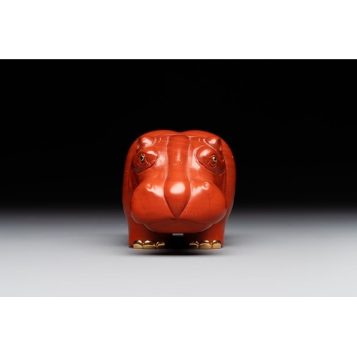 1191 - An 18kt gold mounted red jasper hippopotamus with sapphire inset eyes in Faberge-style, early 20th C... 