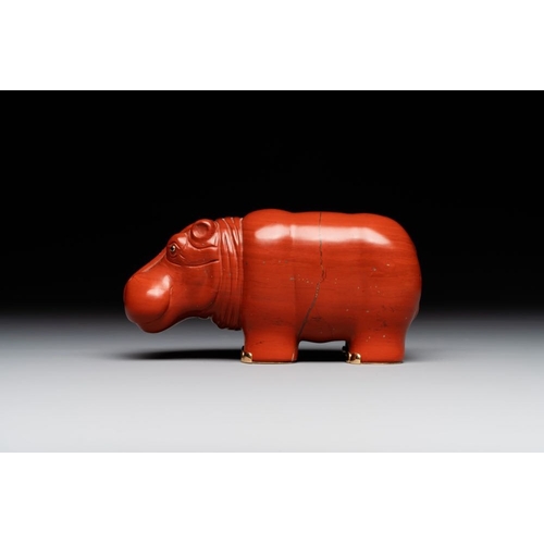 1191 - An 18kt gold mounted red jasper hippopotamus with sapphire inset eyes in Faberge-style, early 20th C... 