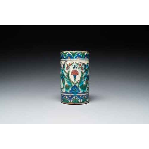 1194 - A polychrome Iznik-style mug with tulips and carnations, Kutahya, Turkey, 19th C.L.: 16,5 cm - H.: 1... 