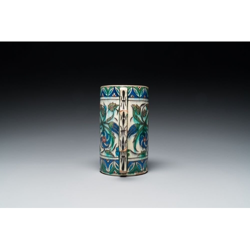 1194 - A polychrome Iznik-style mug with tulips and carnations, Kutahya, Turkey, 19th C.L.: 16,5 cm - H.: 1... 