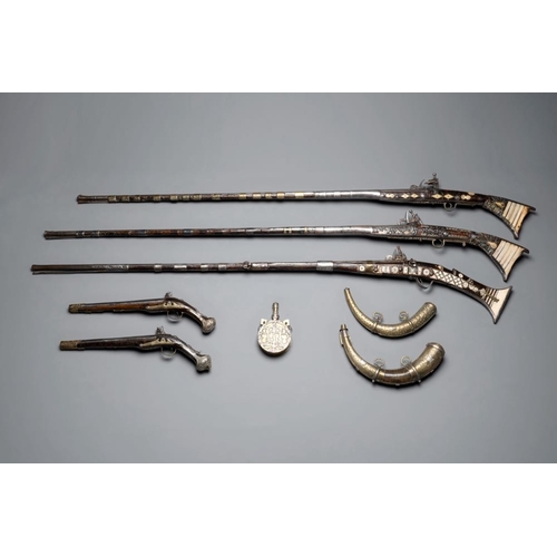 1200 - Three impressive flintlock muskets or 'moukahlas', two percussion pistols and three gunpowder horns,... 