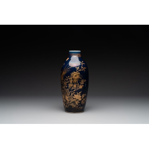 133 - A Chinese powder blue and gilt vase with a pheasant among flowering branches, QianlongH.: 27 cm... 