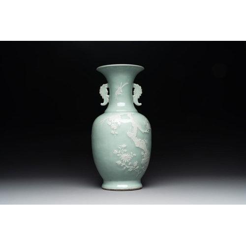 153 - A Chinese slip-decorated celadon-glazed vase with floral design, Qianlong mark and of the periodH.: ... 