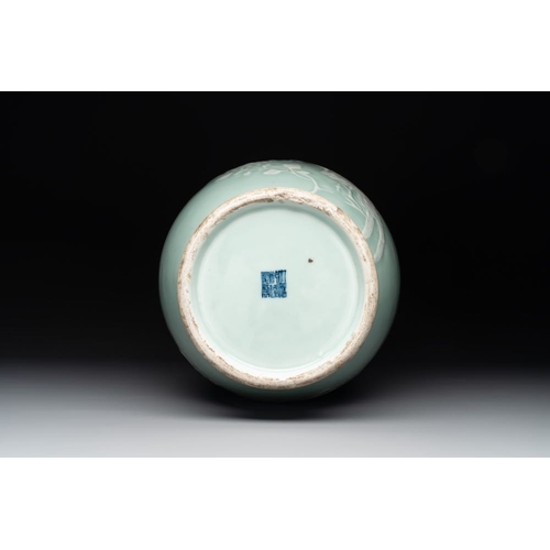 153 - A Chinese slip-decorated celadon-glazed vase with floral design, Qianlong mark and of the periodH.: ... 