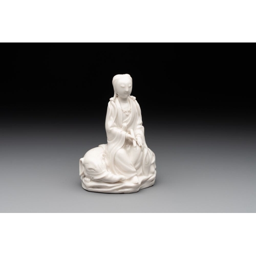 170 - A Chinese Dehua blanc de Chine Guanyin, He Chaozong  mark, 19th C.H.: 13 cm