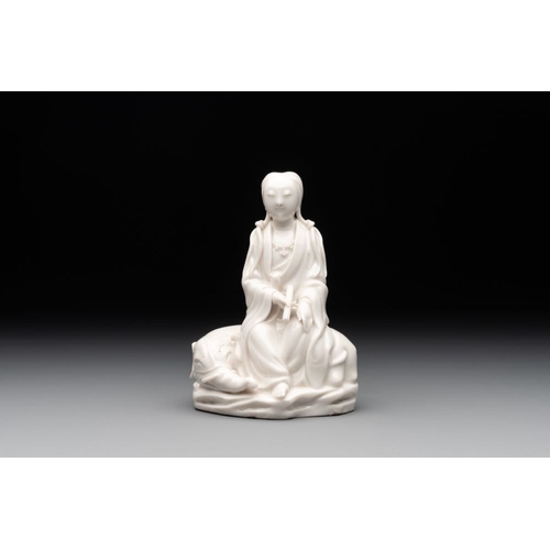 170 - A Chinese Dehua blanc de Chine Guanyin, He Chaozong  mark, 19th C.H.: 13 cm