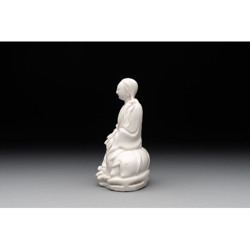 170 - A Chinese Dehua blanc de Chine Guanyin, He Chaozong  mark, 19th C.H.: 13 cm