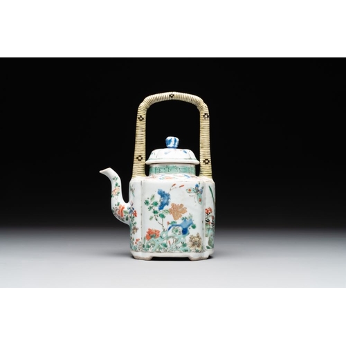 18 - A Chinese famille verte 'flower and butterfly' teapot with an upright handle, KangxiL.: 12 cm - H.: ... 