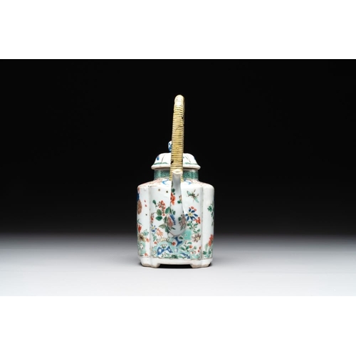 18 - A Chinese famille verte 'flower and butterfly' teapot with an upright handle, KangxiL.: 12 cm - H.: ... 