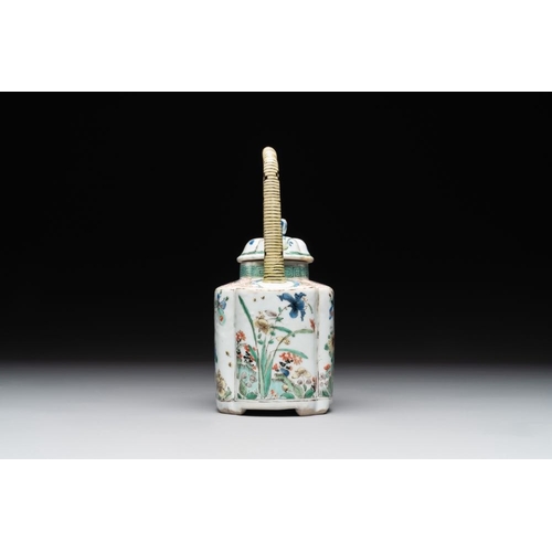 18 - A Chinese famille verte 'flower and butterfly' teapot with an upright handle, KangxiL.: 12 cm - H.: ... 