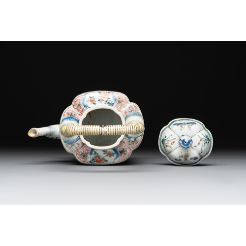 18 - A Chinese famille verte 'flower and butterfly' teapot with an upright handle, KangxiL.: 12 cm - H.: ... 