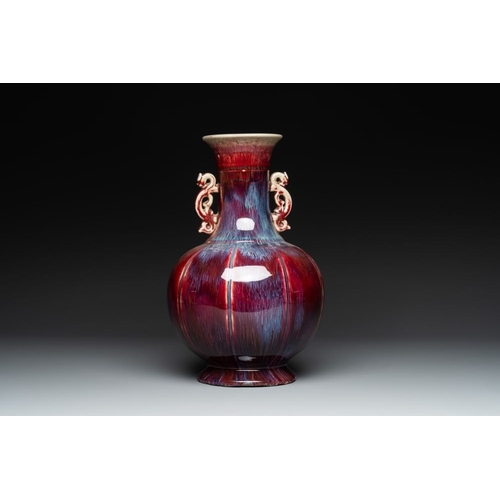 188 - A Chinese flambe-glazed vase with archaistic dragon handles, 19th C.H.: 34,5 cm