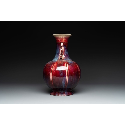 188 - A Chinese flambe-glazed vase with archaistic dragon handles, 19th C.H.: 34,5 cm