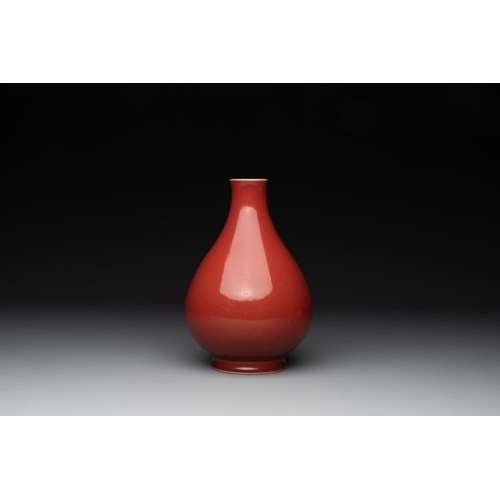 198 - A Chinese copper-red-glazed pear-shaped  vase, Yongzheng mark and of the periodH.: 23 cm... 