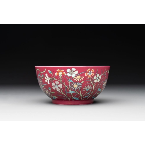 210 - A Chinese famille rose ruby-ground 'peony' bowl, Yongzheng mark,19/20th C.Dia.: 12,5 cm -H.: 6,5 cm... 