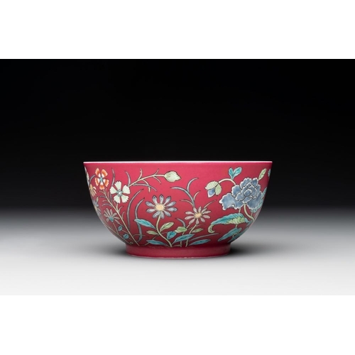 210 - A Chinese famille rose ruby-ground 'peony' bowl, Yongzheng mark,19/20th C.Dia.: 12,5 cm -H.: 6,5 cm... 