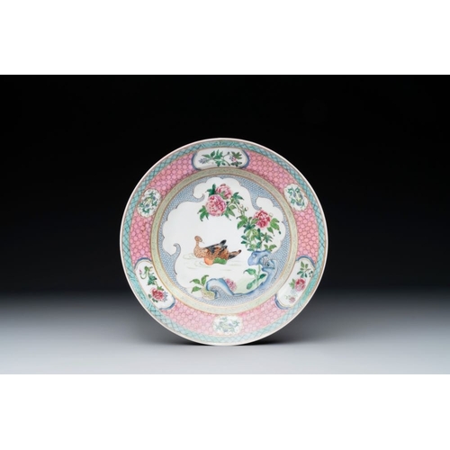 217 - A Chinese famille rose ruby-back 'mandarin ducks' plate and a large capucin-brown-ground Imari-style... 