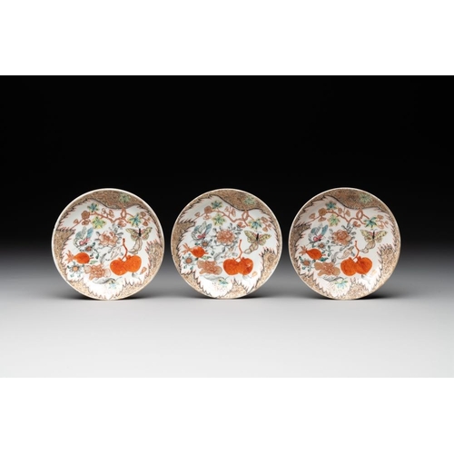 231 - Three Chinese famille rose 'flowers and butterflies' cups and saucers, YongzhengDia.: 11,7 cm (the s... 