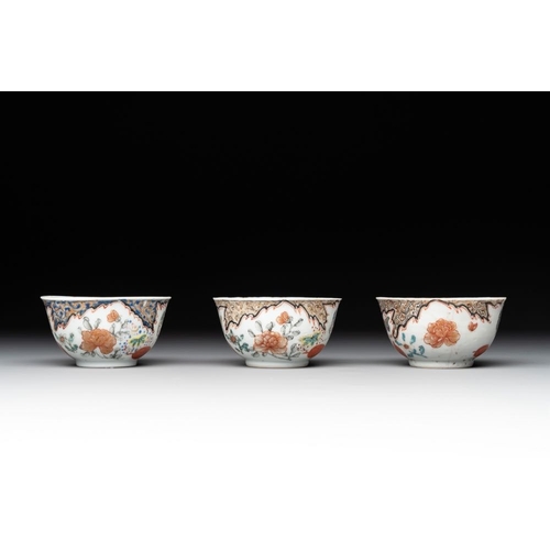 231 - Three Chinese famille rose 'flowers and butterflies' cups and saucers, YongzhengDia.: 11,7 cm (the s... 