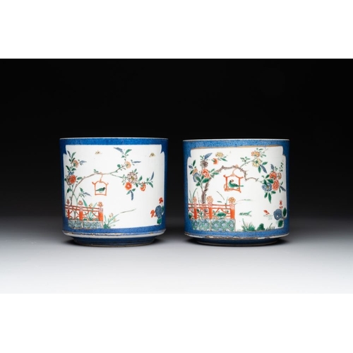 25 - A pair of Chinese powder blue-ground famille verte vessels with a bird in a garden, KangxiH.: 12 cm... 