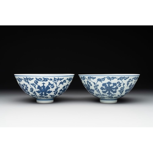 259 - A pair of Chinese blue and white 'lotus scroll' bowls, Yongzheng mark and possibly of the periodDia.... 