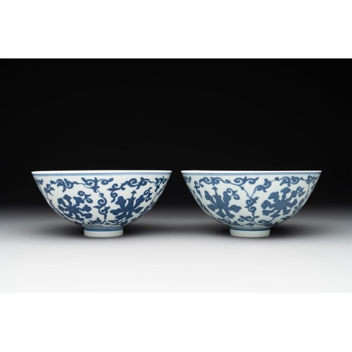 259 - A pair of Chinese blue and white 'lotus scroll' bowls, Yongzheng mark and possibly of the periodDia.... 