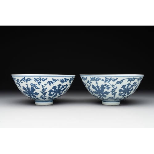 259 - A pair of Chinese blue and white 'lotus scroll' bowls, Yongzheng mark and possibly of the periodDia.... 