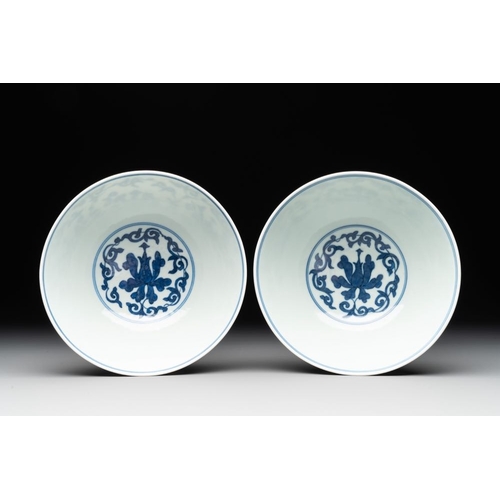 259 - A pair of Chinese blue and white 'lotus scroll' bowls, Yongzheng mark and possibly of the periodDia.... 