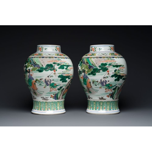 26 - A pair of Chinese famille verte 'Shou Lao' vases, KangxiH.: 35,5 cm