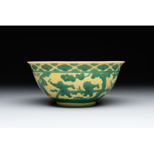 261 - An imperial Chinese green-enamelled yellow-ground 'playing boys' bowl, Yongzheng mark and of the per... 