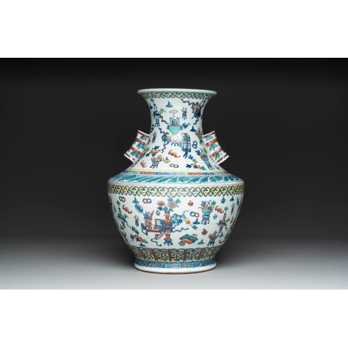 274 - A Chinese doucai 'antiquities' 'hu' vase, Qianlong mark, 19th C.H.: 43 cm