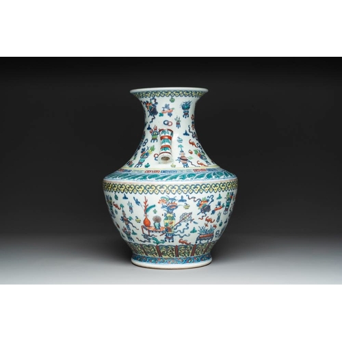 274 - A Chinese doucai 'antiquities' 'hu' vase, Qianlong mark, 19th C.H.: 43 cm