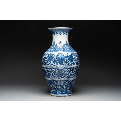 280 - A large Chinese blue and white 'flower scroll' vase, Qianlong mark, 19th C.H.: 61,8 cm
Provenance: P... 