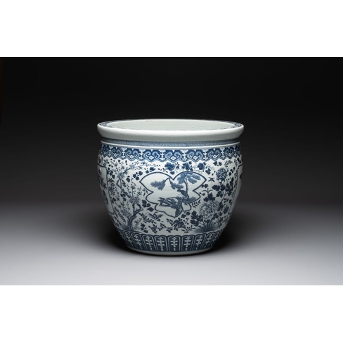 281 - A large Chinese blue and white fish bowl with birds, deer, insects and flowering branches, 19th C.Di... 