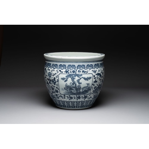 281 - A large Chinese blue and white fish bowl with birds, deer, insects and flowering branches, 19th C.Di... 