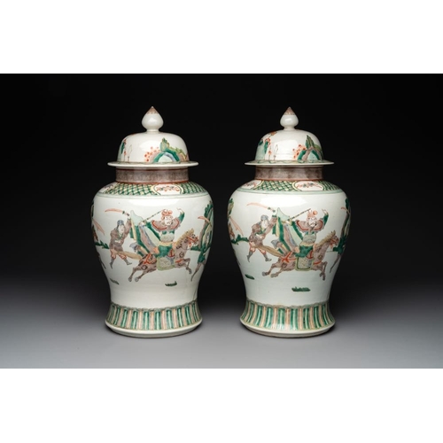 303 - A pair of famille verte-style 'warriors on horseback' vases and covers, Samson, Paris, 19th C.H.: 45... 