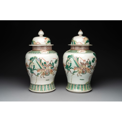 303 - A pair of famille verte-style 'warriors on horseback' vases and covers, Samson, Paris, 19th C.H.: 45... 