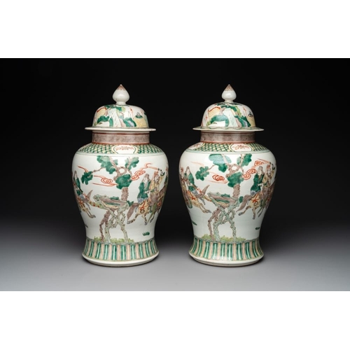 303 - A pair of famille verte-style 'warriors on horseback' vases and covers, Samson, Paris, 19th C.H.: 45... 